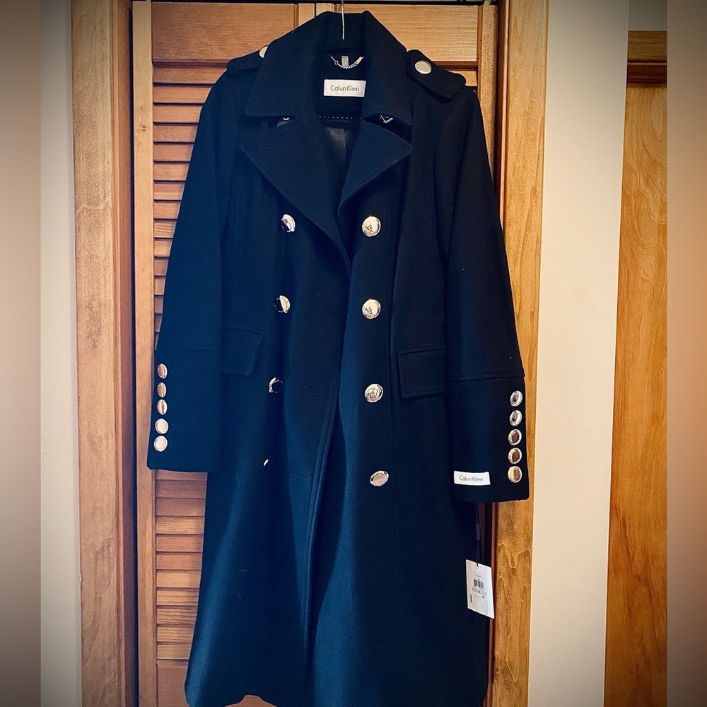 Calvin Klein wool-blend double- breasted military-style coat with gold buttons.